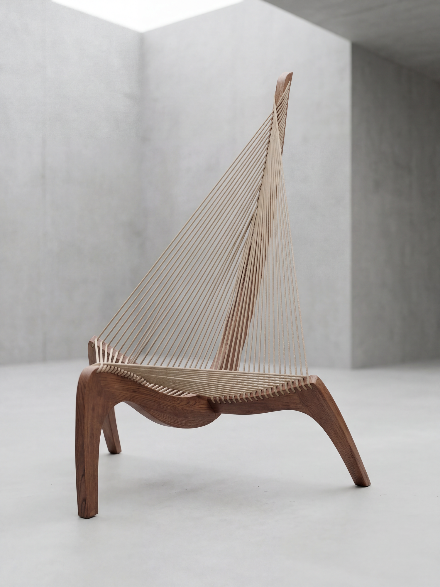 KAI Highback lounge chair with solid wood frame and woven rope – front view