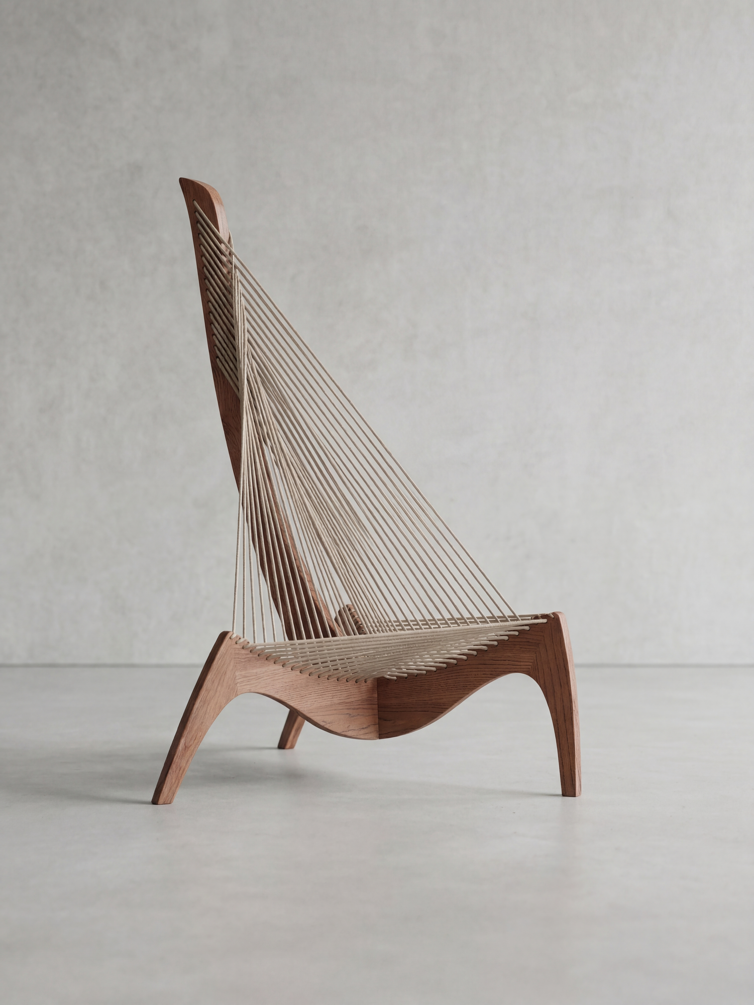 KAI Highback lounge chair – side profile showing the high back