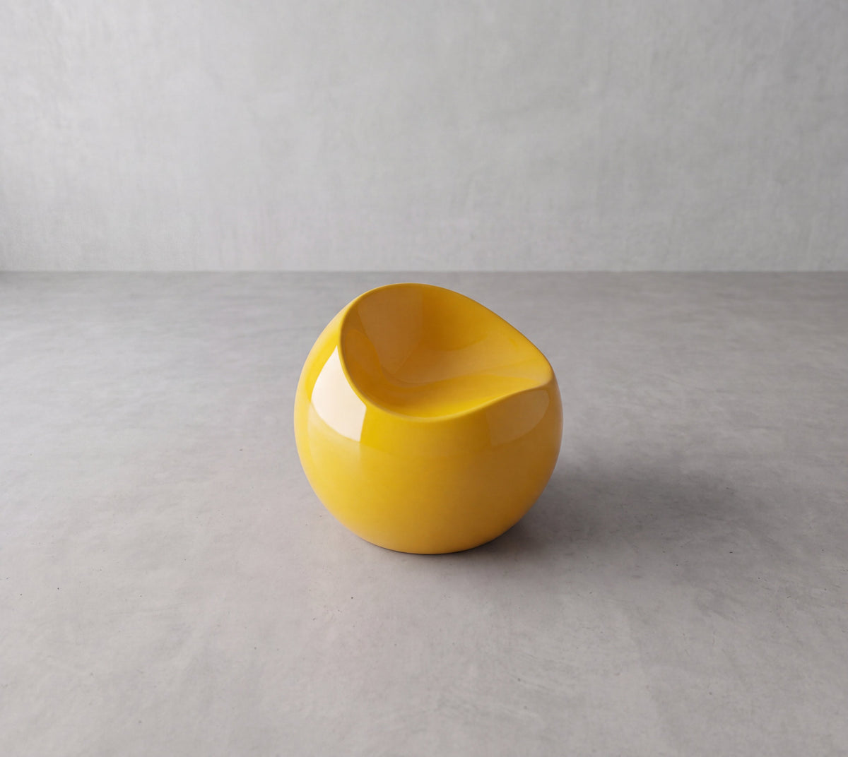 PACCO Low Chair – angled view showing the low profile