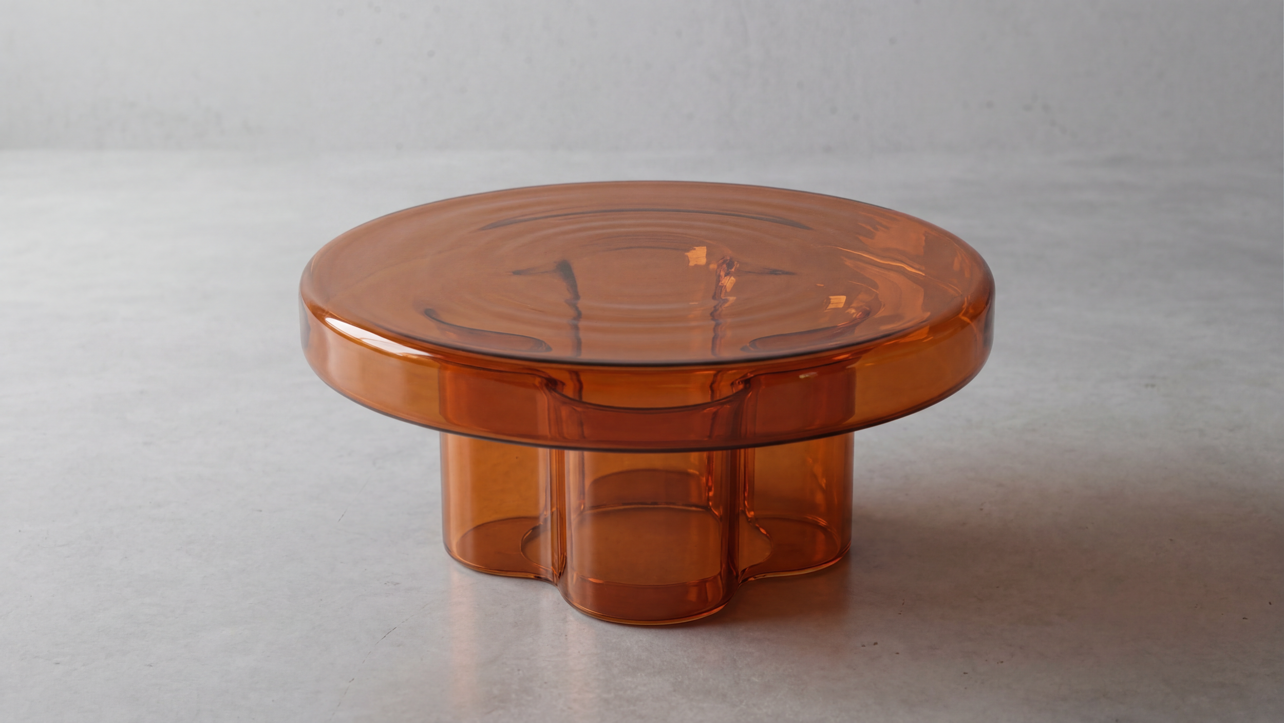 AURELIO amber acrylic coffee table styled in a living room