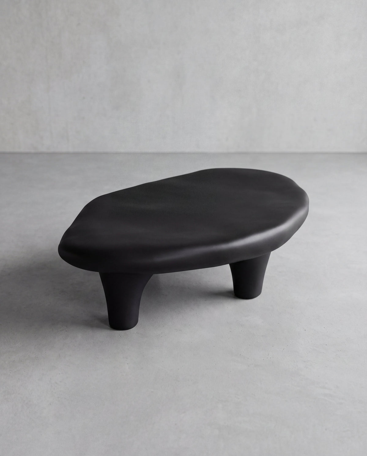 KANO Coffee Table – detail of the hand-carved look and matte black finish