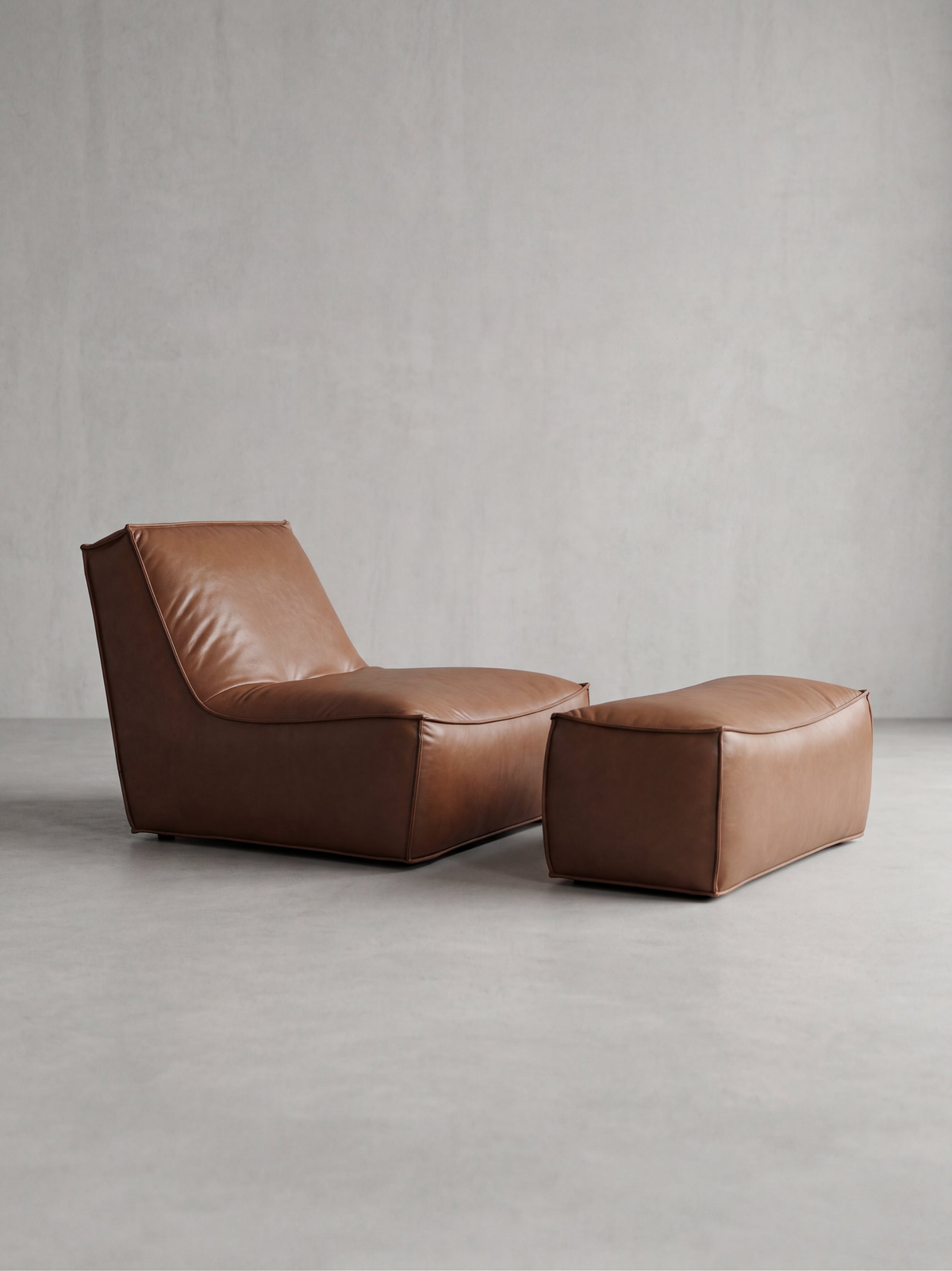 LUCA lounge chair with matching ottoman – front view