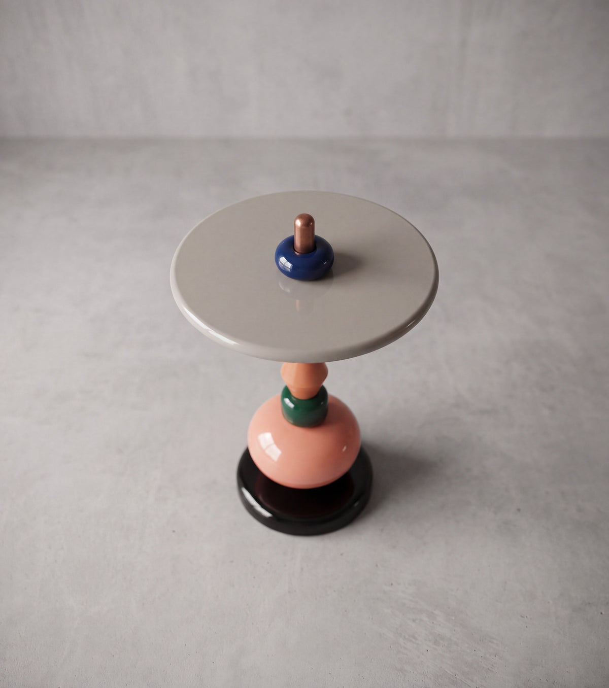 TOTO Side Table – angled view of the colorful stacked composition